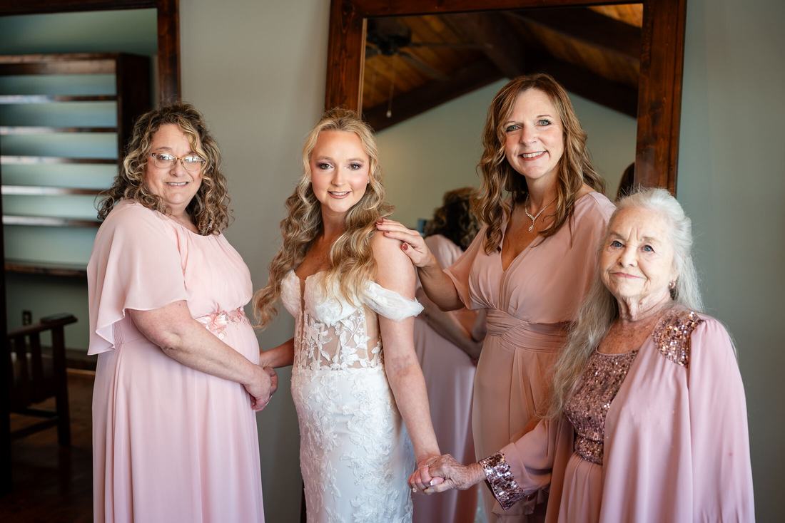 Bride with mothers and grandmother before the ceremony