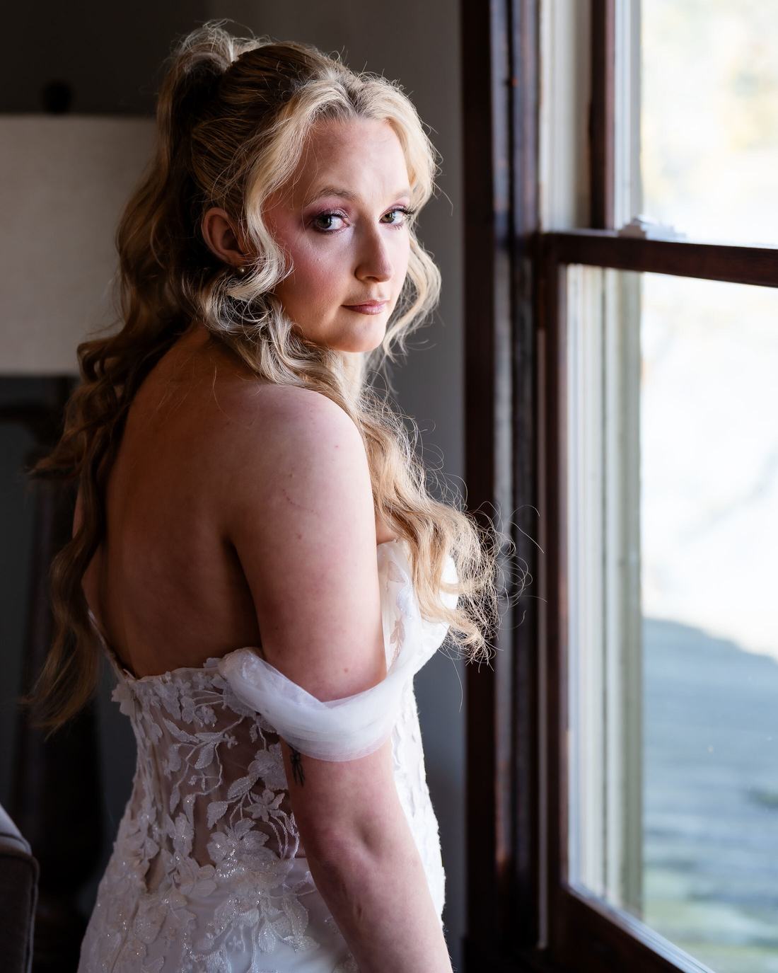 Bride in window light photographed by Blue Haven Hawaii