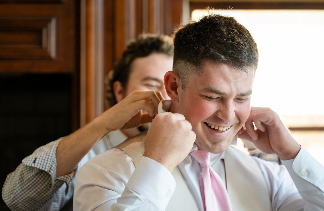 Groom getting ready with groomsmen